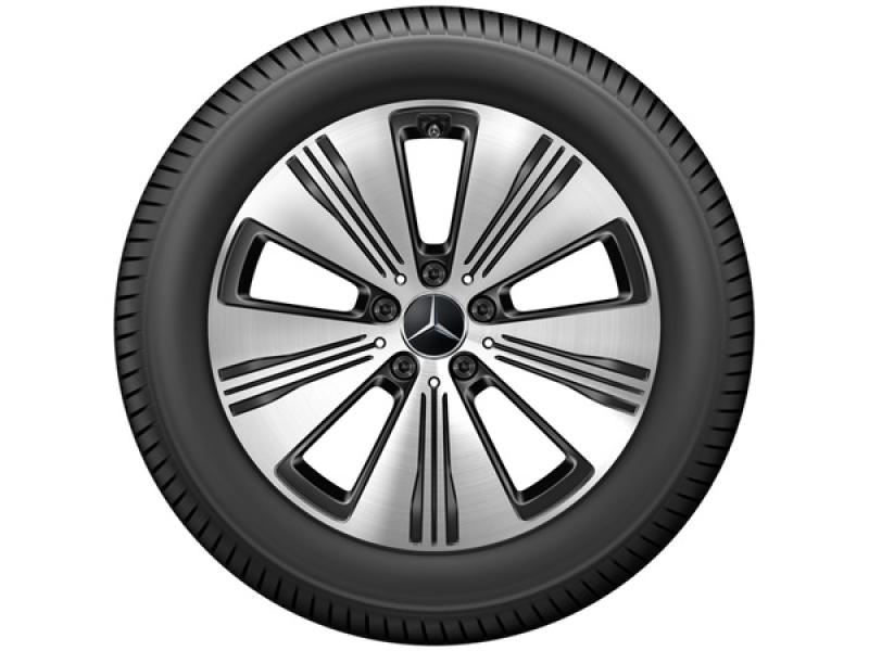 Original Mercedes-Benz Leichtmetallfelge mit 5-Doppelspeichen-Design in Silber-Schwarz, inklusive montiertem Reifen. Die Felge trägt das Mercedes-Benz Logo in der Mitte und überzeugt mit sportlich-eleganter Optik.